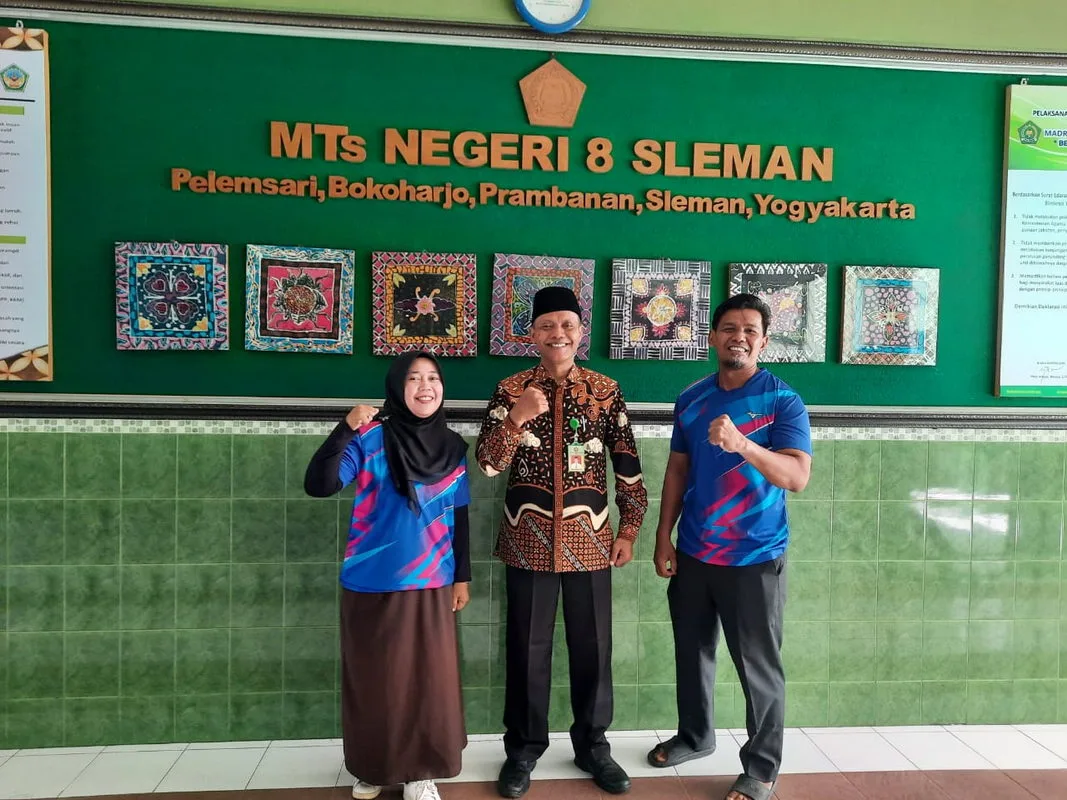 Tim Badminton Ganda Campuran MTsN 8 Sleman Menang di Laga Perdana HAB ke-79 Kemenag Sleman