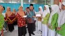 MTsN 9 Sleman Fasilitasi DWP Kemenag Sleman Salurkan Beasiswa BAZNAS untuk 27 Siswa di Wilayah Kapanewon Depok